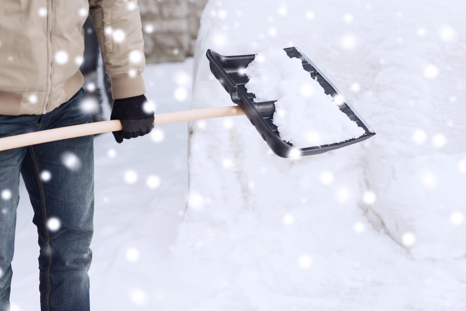 TINSA USA personnel clearing snow from a residential property